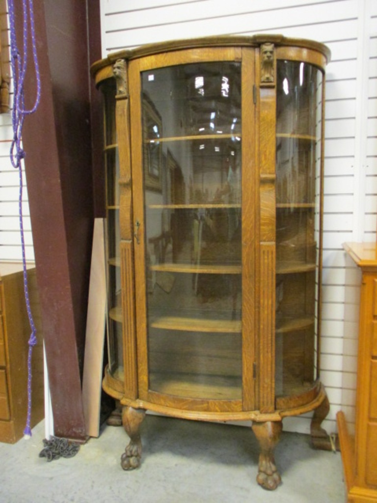 Lot Oak Curved Curio Cabinet With Lion Heads And Claw Feet Oak Curved Curio Cabinet With Lion Heads And Claw Feet