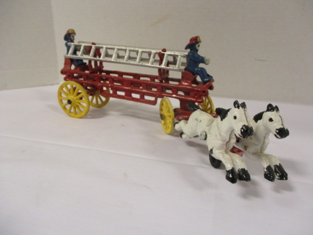 cast iron horse drawn fire wagon