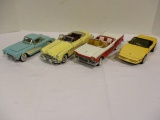 Four Franklin Mint Die Cast Cars