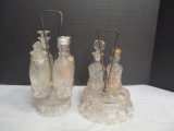 Two Antique Glass Condiment Carriers with Some Bottles