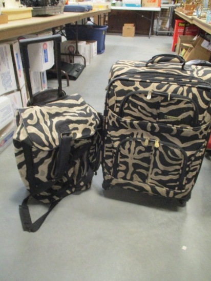 Two Leisure Soft-side Rolling Suitcases