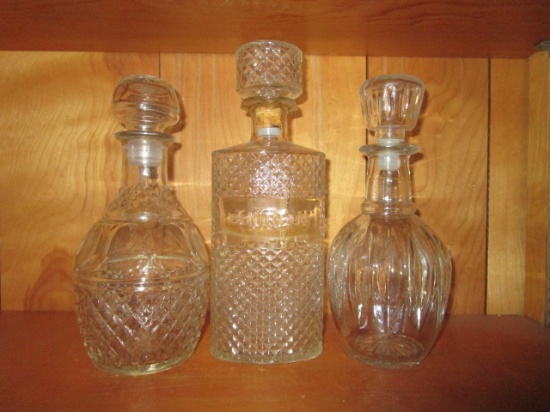 Three Pressed Glass Decanters