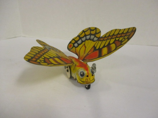 Tin Litho Wind Up Butterfly on Wheels