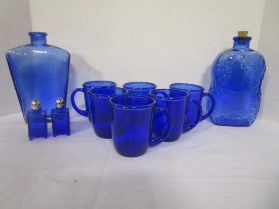 Six Blue Glass Cups, Salt/Pepper Set and Two Bottles