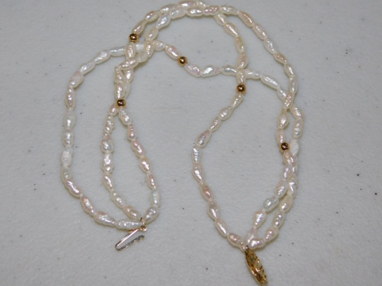Seed Pearl Bracelet Clasp reads 14 KT