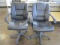 Two Rolling Office Chairs with Arms