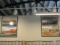 Three Framed Prints with Historical and Current Photos of Hub City Co-Op Building