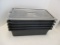 Five Black Cooler Bins with One Lid