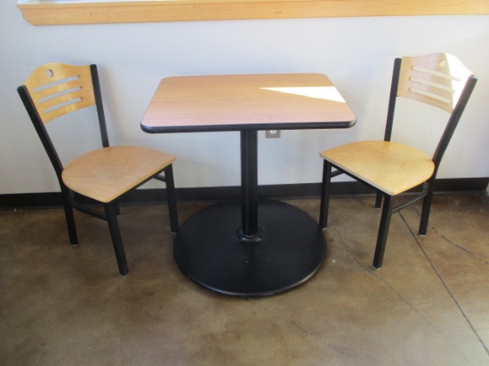Table with Two Metal and Wood Chairs