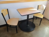 Table with Two Metal and Wood Chairs
