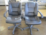 Two Rolling Office Chairs with Arms