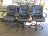 Three Rolling Office Chairs with Arms