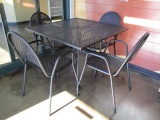 Black Metal Table with Four Chairs