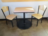 Table with Two Metal and Wood Chairs