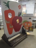 Large Rolling Picture Taking Board with Face Cutouts and Small Sign