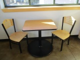 Table with Two Metal and Wood Chairs