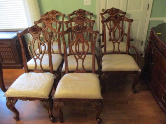 Eight Ornately Carved Chairs