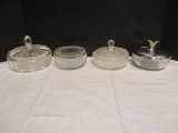 Four Round Covered Dishes