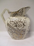 Antique Brown and White Pitcher