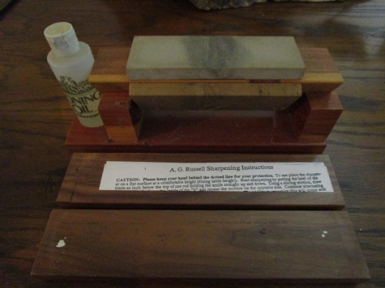 Two A.G. Russell Ceramic Sharpeners and Three Sided Sharpening Stones in