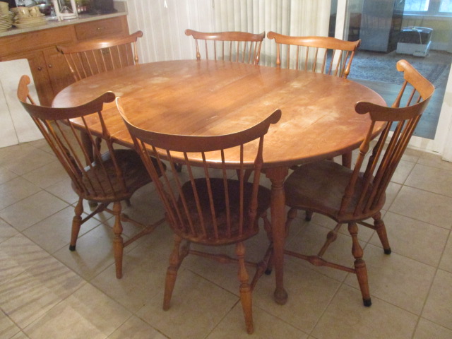 Nichols Stone Dining Table with Two Leaves and Proxibid