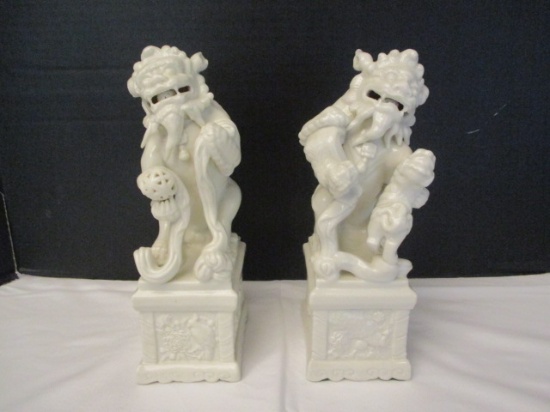 Pair of Fine Porcelain Foo Dog Statues