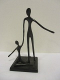 Abstract Black Metal Man and Woman Statue