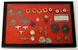 Riker Case of Various German Nazi items - Totenkopf Collar Badges, Cap Badges, Medals, & More