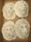 Four Plaster Lion Head Wall Plaques