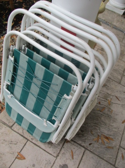 Four Aluminum Folding Chairs