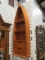 Pine Wall Display Shelf in Shape of Canoe Bow