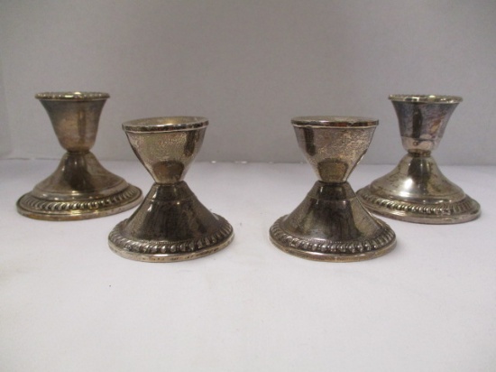 Two Pair of Weighted Sterling Silver Candle Holders