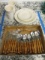 12 Pieces of Corelle Dinnerware and Set of Wood Handle Flatware