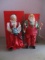Clothtique Mrs. Claus with Doll and Carpenter Santa with Boxes