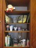 Cabinet Contents - Golf Books, Pillow, Mugs, Balls, Tees