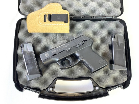 Taurus Millennium PT 140 .40 S&W Semi-Automatic Pistol with 2 Magazines + Holster