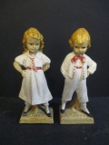 Pair of Chalk ware Boy and Girl Figurines