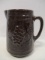 Star Stoneware Brown Pottery Pitcher with Grape Cluster Design