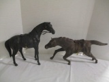 Two Leather Covered Horse Statues