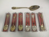 Six Bahrain Souvenir Spoons and Silverplate Spoon