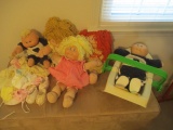 Five Cabbage Patch Kid Dolls, Clothes and Doll Baby Carrier