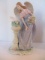 Porcelain Angel with Dove Statue