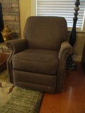 Recliner with Slide-Up Head Rest