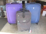 Blue and Purple Travelpro Suitcases and Ciao! Carry-On Suitcase