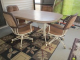 Vintage Metal Table with Wood Top and Four Chairs on Casters