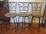 Three Metal Swivel Bar Stools with Upholstered Seats
