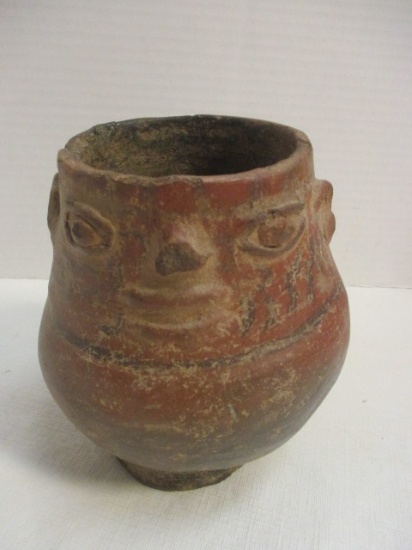 Pottery Vessel With Applied Facial Features