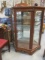 Wood Lighted Curio Cabinet with Glass Shelves and Mirrored Back