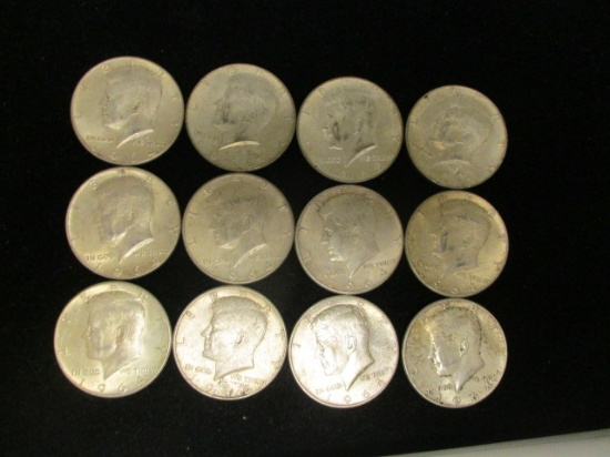 Lot of (12) Kennedy Half Dollars