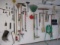 Contents of Right Garage Wall-Yard Tools, Garden Hose, Rubber Boots, Framing Square, etc.